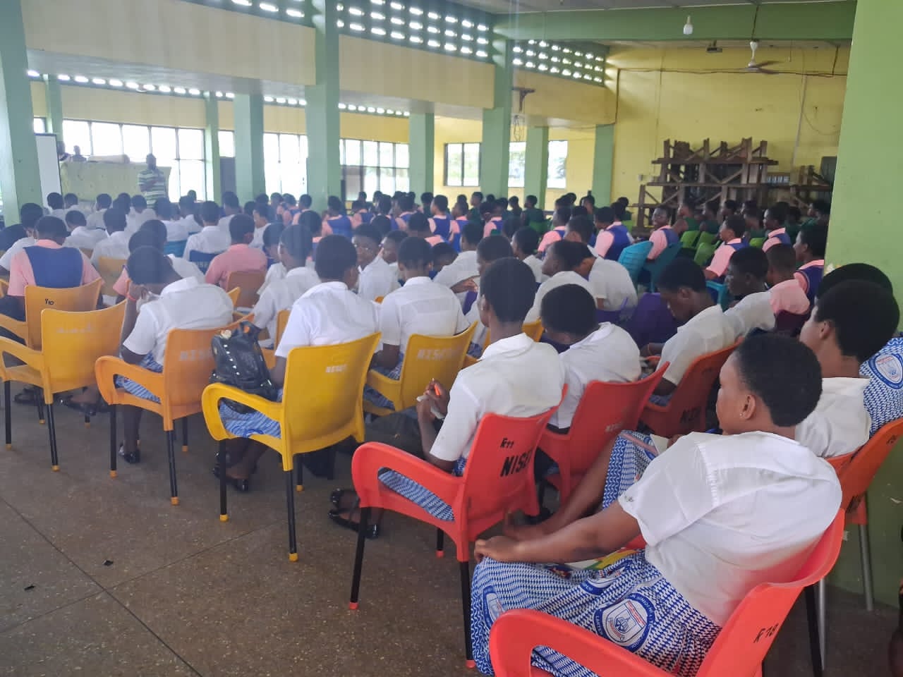 School leadership addressing students